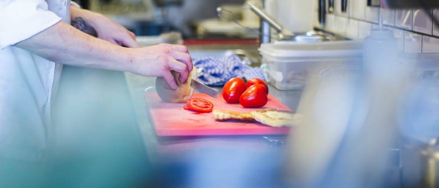 Ontario food handlers using digital checklists and guides in a commercial kitchen